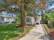 Charming house with a large tree and landscaped yard at 1815 Larkin Ave, Orlando, FL 32812