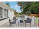 Relax on this deck featuring a seating area and a swing at 1815 Larkin Ave, Orlando, FL 32812