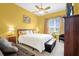 Bedroom with a king-size bed and window coverings at 500 Arena Dr, Davenport, FL 33837