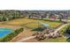 Fenced dog park with shaded seating area at 500 Arena Dr, Davenport, FL 33837