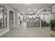 Modern kitchen with an island, white cabinets, and granite countertops at 2393 Appy Ln, Apopka, FL 32712