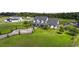 Stunning aerial view of a two-story home with a circular driveway at 2393 Appy Ln, Apopka, FL 32712