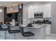 Modern kitchen with granite countertops and stainless steel appliances at 7514 Sunflower Cir, Kissimmee, FL 34747