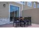 Outdoor patio with table and chairs, perfect for relaxing at 7514 Sunflower Cir, Kissimmee, FL 34747