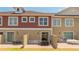 Townhouse patio with seating areas at 7514 Sunflower Cir, Kissimmee, FL 34747