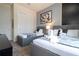 Bright bedroom featuring two twin beds and ample closet space at 7514 Sunflower Cir, Kissimmee, FL 34747