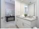 Clean bathroom with double vanity and walk-in shower at 7514 Sunflower Cir, Kissimmee, FL 34747