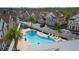 Aerial view of community pool and townhouses at 7514 Sunflower Cir, Kissimmee, FL 34747