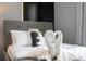Cozy bedroom with a queen bed and stylish decor at 7514 Sunflower Cir, Kissimmee, FL 34747