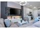 Living room features a large TV and comfortable seating at 7514 Sunflower Cir, Kissimmee, FL 34747