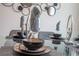 Elegant dining room showcasing a beautifully set table at 7514 Sunflower Cir, Kissimmee, FL 34747