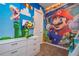 bedroom with bunk beds and Mario theme at 7514 Sunflower Cir, Kissimmee, FL 34747