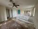 Spacious loft area with ceiling fan and multiple closets at 7706 Excitement Dr, Reunion, FL 34747