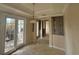 Breakfast nook with French doors leading to a private patio at 7706 Excitement Dr, Reunion, FL 34747