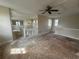 Spacious loft area with high ceilings and hardwood floors at 7706 Excitement Dr, Reunion, FL 34747