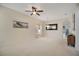 Bright dining room with neutral decor and carpeted floor at 1033 Hacienda Cir, Kissimmee, FL 34741