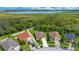 Aerial view showcasing house location near water at 1033 Hacienda Cir, Kissimmee, FL 34741