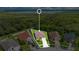 Aerial view of the house and surrounding neighborhood at 1033 Hacienda Cir, Kissimmee, FL 34741