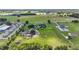 Aerial view of property with home, outbuildings, and large lot at 2393 Appy Ln, Apopka, FL 32712