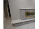 Modern fireplace with marble surround and hearth at 20797 Racine St, Orlando, FL 32833