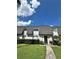 Condo building exterior with grassy lawn at 1944 Conway Rd # 6, Orlando, FL 32812