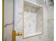 Marble shower niche with hexagon tile at 6165 Carrier Dr # 1210, Orlando, FL 32819