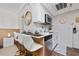 Bright, updated kitchen with breakfast bar and modern appliances at 6165 Carrier Dr # 1210, Orlando, FL 32819