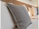Close-up of gray decorative pillow at 6165 Carrier Dr # 1210, Orlando, FL 32819