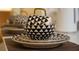 Stylish black and white patterned dishes at 6165 Carrier Dr # 1210, Orlando, FL 32819