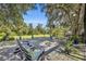 Spacious deck with comfortable seating overlooking a tranquil landscape at 2075 Genova Dr, Oviedo, FL 32765