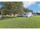 Expansive green lawn in front of the house, providing ample outdoor space at 6123 Randolph Ave, Orlando, FL 32809