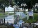 Gated private lake access with a no swimming sign at 50989 Highway 27 # 366, Davenport, FL 33897