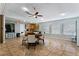 Community room with tables, chairs, and kitchen facilities at 11 Escondido Cir # 105, Altamonte Springs, FL 32701