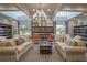 Community library with comfortable seating and many books at 8632 Bridgeport Bay Cir, Mount Dora, FL 32757