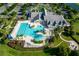 Community pool and clubhouse aerial view at 8632 Bridgeport Bay Cir, Mount Dora, FL 32757