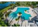 Resort-style pool with a spa and beach entry at 8632 Bridgeport Bay Cir, Mount Dora, FL 32757