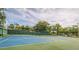 Community tennis courts with green and blue surface at 11 Escondido Cir # 105, Altamonte Springs, FL 32701