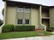 Exterior view of a condo building showcasing building 7 at 11 Escondido Cir # 105, Altamonte Springs, FL 32701
