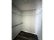 Well-lit closet with wire shelving and hanging rod at 733 Robin Ct, Kissimmee, FL 34759