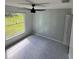 Bedroom with large window and ceiling fan at 733 Robin Ct, Kissimmee, FL 34759