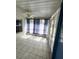 Sunroom with tile floors and ceiling fan at 733 Robin Ct, Kissimmee, FL 34759