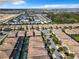 Aerial view of a neighborhood with many houses and pools at 8844 Corcovado Dr, Kissimmee, FL 34747