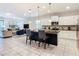 Modern kitchen with white cabinets and large island at 8844 Corcovado Dr, Kissimmee, FL 34747