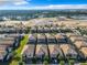 Aerial view of a community with new homes and construction at 8844 Corcovado Dr, Kissimmee, FL 34747
