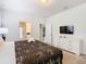 Main bedroom with king bed and TV at 8844 Corcovado Dr, Kissimmee, FL 34747