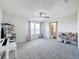 Charming bedroom with window seating and a built-in shelving unit at 5616 Arborvista Dr, St Cloud, FL 34771