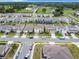 Community overview: many homes with landscaping at 5616 Arborvista Dr, St Cloud, FL 34771