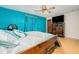 Spacious bedroom with wood flooring and ceiling fan at 894 Quarters Ct, Port Orange, FL 32129
