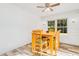 Bright dining area with wood table and chairs, near sliding doors at 894 Quarters Ct, Port Orange, FL 32129
