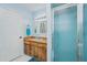 Bathroom with wood vanity and shower stall at 894 Quarters Ct, Port Orange, FL 32129